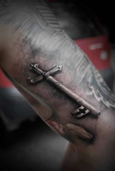 Ancient Cross Guy's Tattoo