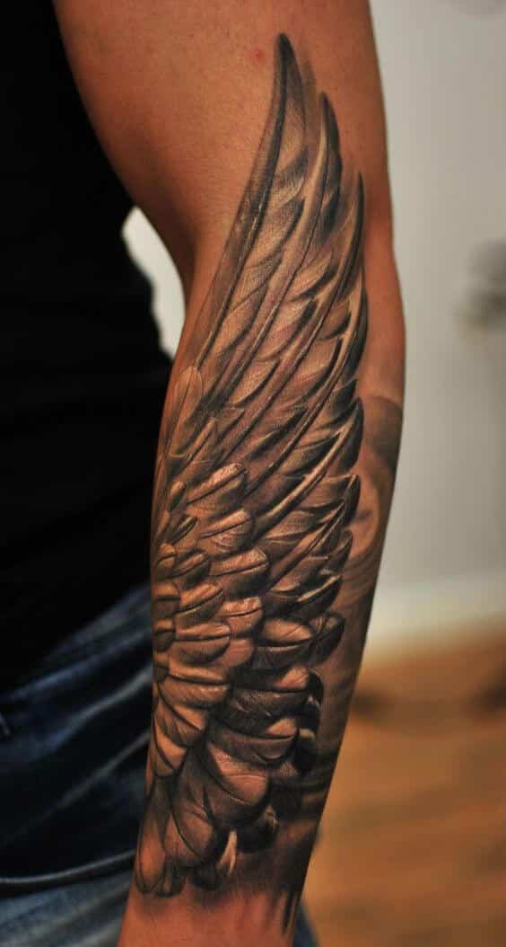 wing tattoo forearm