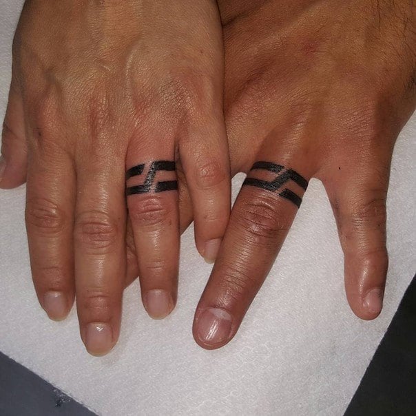 Ring Finger Tattoo Designs For Men 10